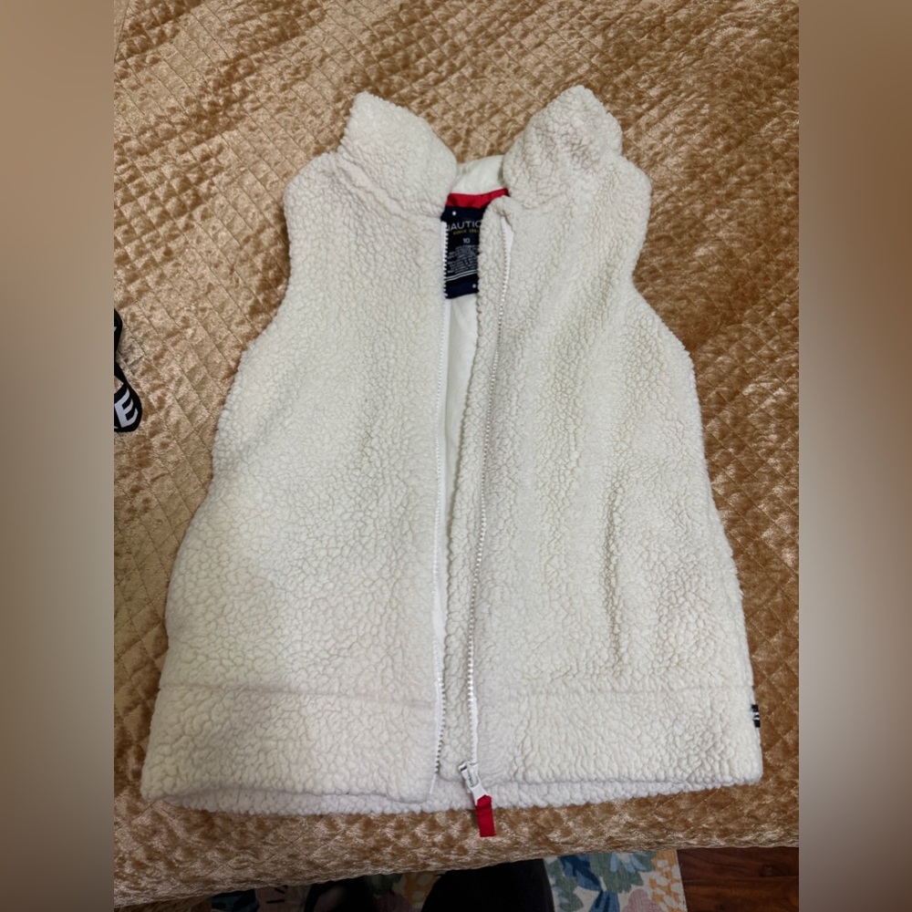 Girl’s white fleece vest